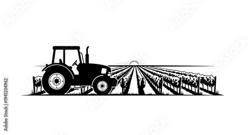 Agricultural silhouette featuring a modern tractor working in a vast vineyard landscape at sunset