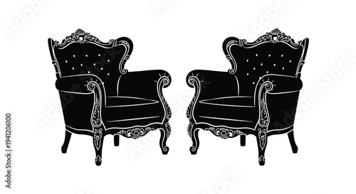 Two ornate black armchairs facing each other a symmetrical design