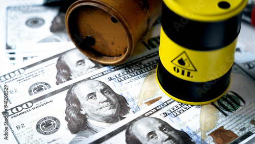 A barrel of oil and dollars on the table. Concept of cost and sale of a barrel of oil.