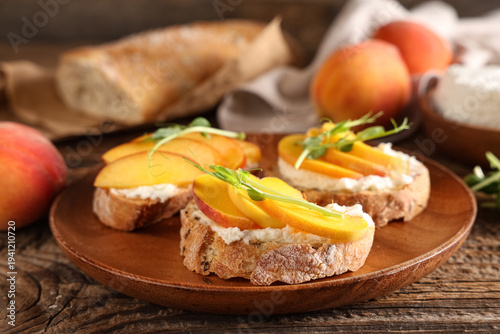 Plate of peach bruschetta w...