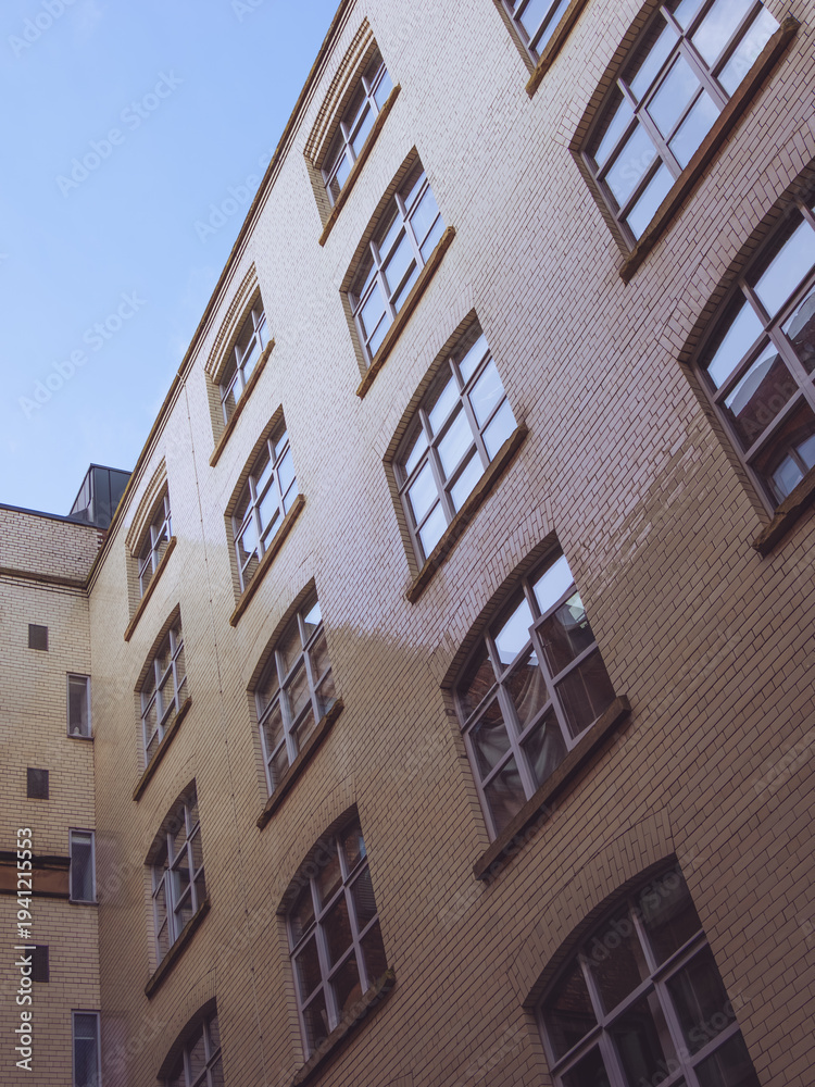 Obraz premium An example of Victorian glazed bricks used in a courtyard of an industrial mill in Manchester, UK
