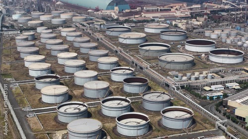 Industrial oil refinery storage tanks aerial view