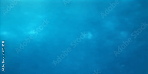 A deep blue ocean surface ripples with natural wave patterns as sunlight pierces the water texture to create a serene nature backdrop and artistic wallpaper design