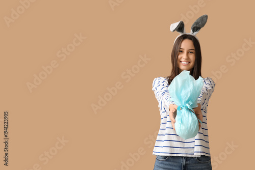 Pretty young woman with bun...