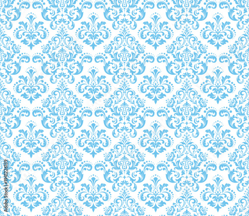 Wallpaper in the style of Baroque. White and blue floral ornament. Seamless vector background. Graphic pattern for fabric, wallpaper, packaging. Ornate Damask flower illustration