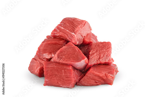 Fotografía red raw beef meat cut into pieces in a small pile - isolate on a white background, ingredient dose measure to add to recipes when cooking according to recipes