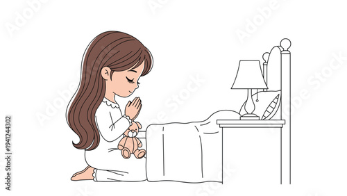 Young girl with long brown hair wearing white pajamas kneels by her bed to pray with her hands together and a teddy bear by her side.