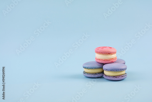 Traditional French almond cookies with sweet filling. Assorted colorful macarons