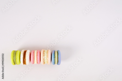 Traditional French almond cookies with sweet filling. Assorted colorful macarons
