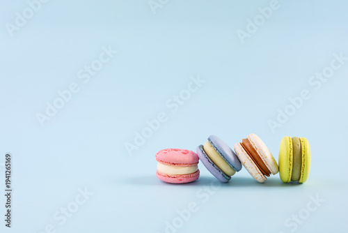Traditional French almond cookies with sweet filling. Assorted colorful macarons