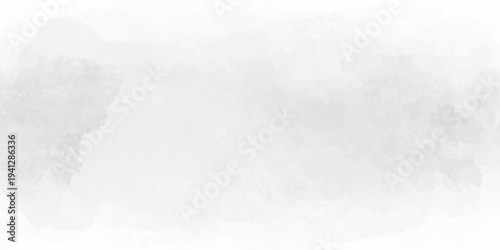 Abstract watercolor wash background in light gray and white with soft ink stains, paint splashes, and cloudy gradient paper texture, minimalist grunge surface for creative design.