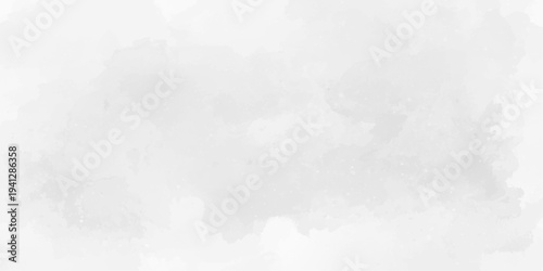Abstract watercolor wash background in light gray and white with soft ink stains, paint splashes, and cloudy gradient paper texture, minimalist grunge surface for creative design.