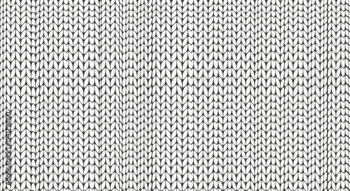 Close-up of a white knitted fabric texture with a subtle wave pattern, abstract background