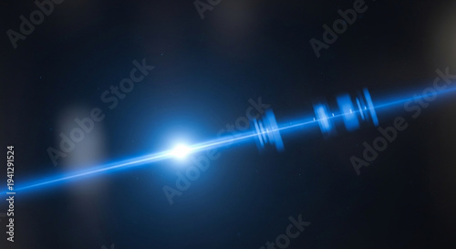 A bright blue laser beam shining with a glowing light on a dark background with a futuristic and technological feel to it with a sense of power and energy