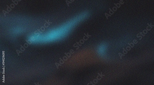 Abstract cyan blue light trails with film grain on dark moody texture