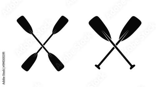 Two crossed paddles create a striking black graphic silhouette
