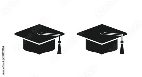 Two black graduation caps displayed against a white background