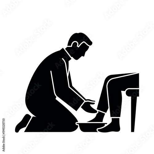 Man washing feet of another person.