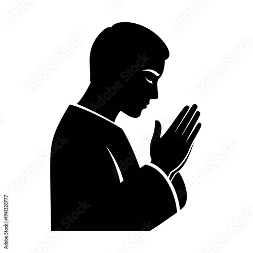Silhouette of a man praying with hands clasped in devotion.