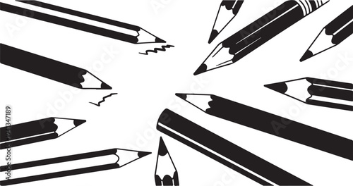 Collection of black and white pencils on white background