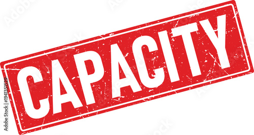 Red Distressed Rectangular Rubber Stamp Impression with the Word Capacity in White Letters