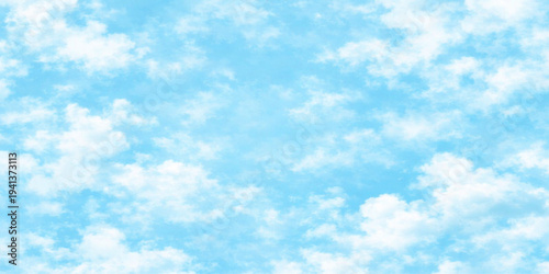 Abstract, A serene expanse of a bright blue sky, adorned with fluffy, cotton-like clouds, creating a peaceful and dreamlike scene. 