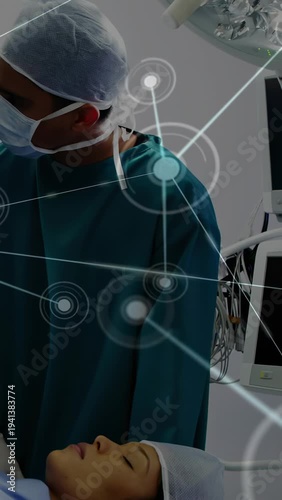 Vertical video: Clinician adjusting hands over patient, activating HUD overlay guiding surgery