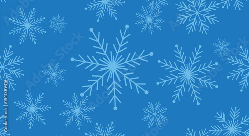 Winter themed seamless pattern with various light blue snowflakes of different shapes and sizes on a solid blue background for holidays.