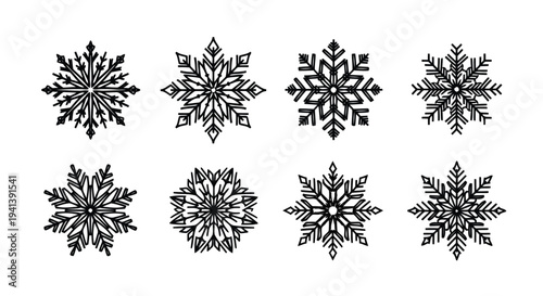Intricate geometric patterns of symmetrical snowflakes in black and white designs