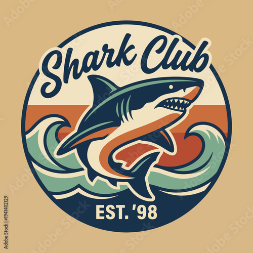 This vibrant logo showcases a fierce shark amidst stylized waves, representing ocean adventure and exploration, perfect for any marine-themed establishment or event.