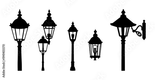Street lamp set with solid black silhouette design featuring old-fashioned style, Victorian urban symbol with high contrast and white background