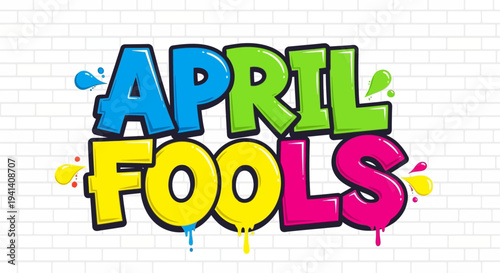 Colorful april fools graffiti text on white brick wall background with paint splatters