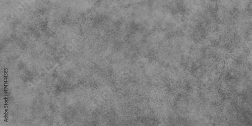 Abstract texture captures the essence of a raw, unadorned surface. It evokes a sense of depth, with subtle variations in tone, presenting a versatile background option.