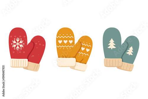 Collection of three pairs of festive winter mittens with cute patterns and warm cuffs
