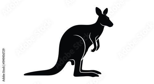 A striking silhouette of a kangaroo in a standing position