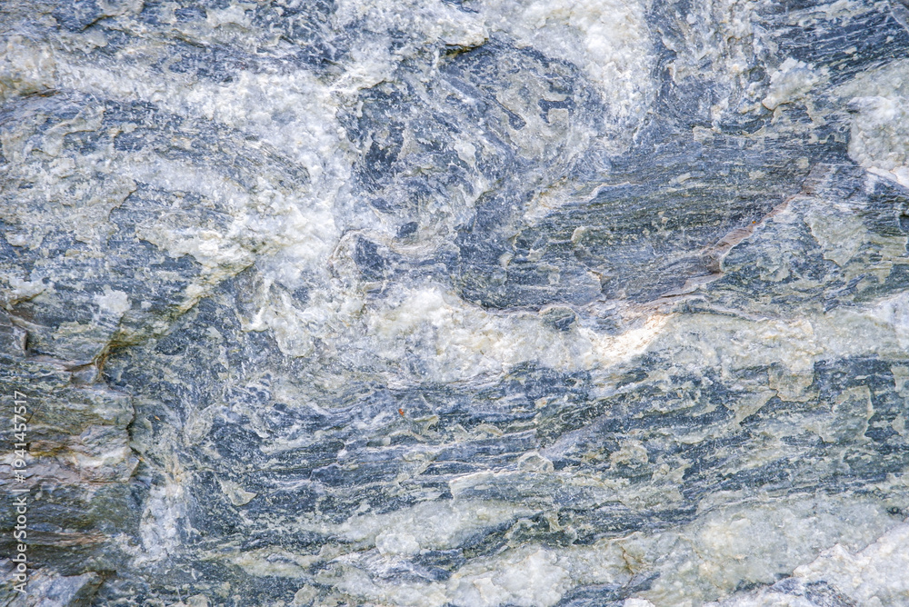 Naklejka premium Close up of limestone surface texture. Sedimentary rock background