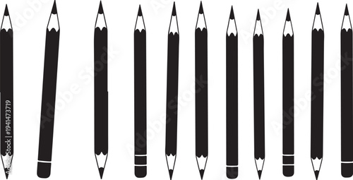 Black Pencils Arranged in a Row on White Background
