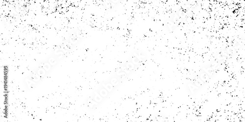 Minimalist grunge texture with scattered black ink splatters on a white background, abstract, high contrast, distressed aesthetic.