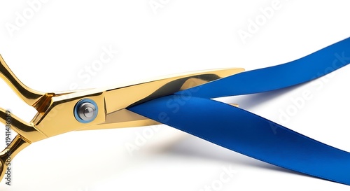 Golden scissors cutting blue ribbon on white background