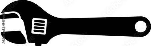 Black silhouette of an adjustable wrench, isolated on a white background