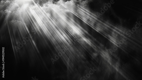 Darkness breaks with radiant beams piercing through mist. Light flows like liquid energy across the shadowy void. Dramatic contrast highlights motion and mystery. Ideal for abstract design
