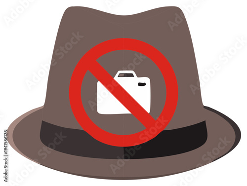 Prohibition sign on a brown fedora hat representing photo restrictions and no photography