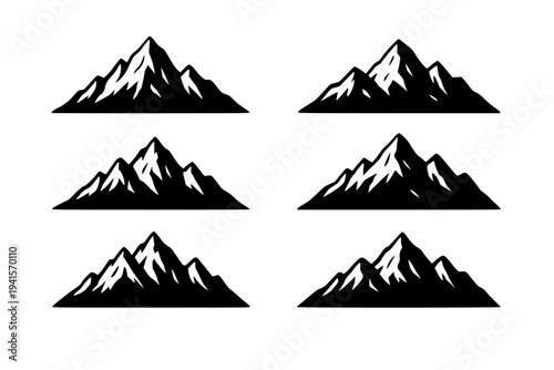 Snowy mountain peaks in black silhouette on white background
