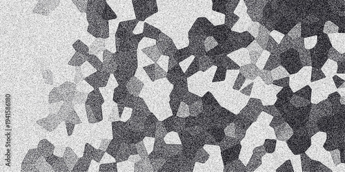 Abstract grayscale mosaic pattern with irregular polygonal shapes and a distinct grainy texture, offering a textured background for creative design and digital art projects