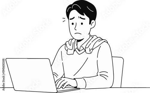 A stressed person works on a laptop, looking concerned