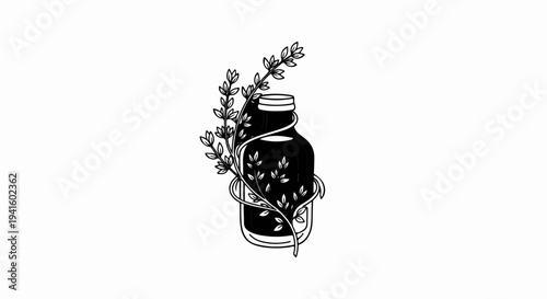 A dark bottle entwined with a delicate branch of leaves