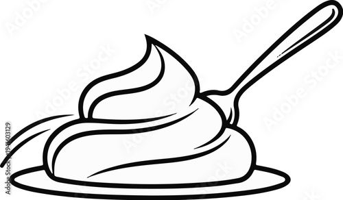 A dollop of whipped cream on a plate with a spoon scooping it up