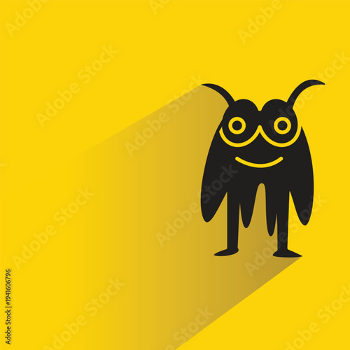 funny monster character with shadow on yellow background