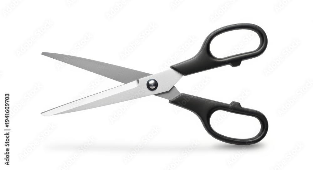 Fototapeta premium Professional grade scissors with black rubber handles and sharp stainless steel blades on a white background