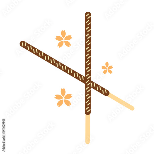 Two chocolate dipped biscuit sticks crossed with small yellow decorative stars on white background.